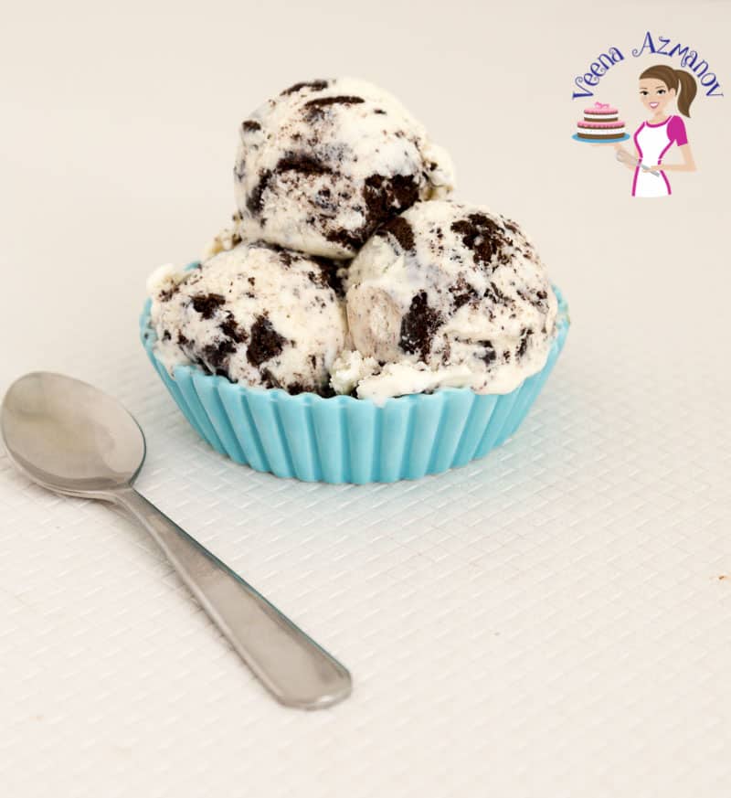 A bowl with 3 scoops of Oreo ice cream.