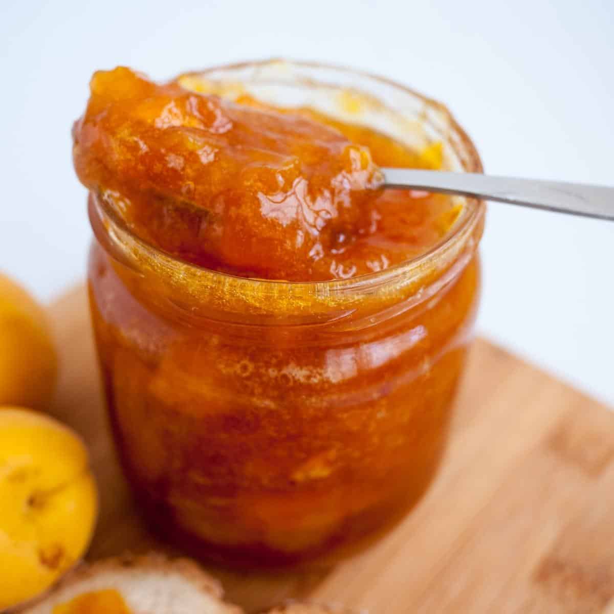 A jar with apricot jam.