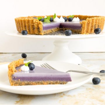 A sliced panna cotta tart.