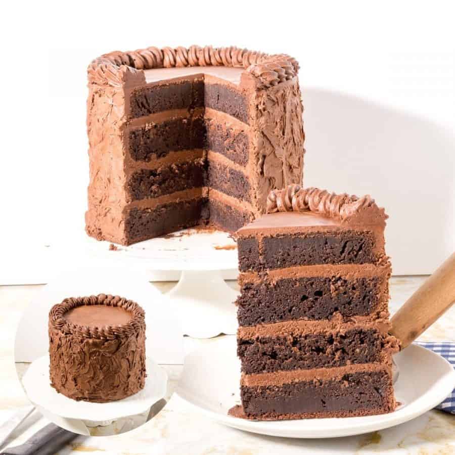 A piece of Chocolate fudge cake on a plate.