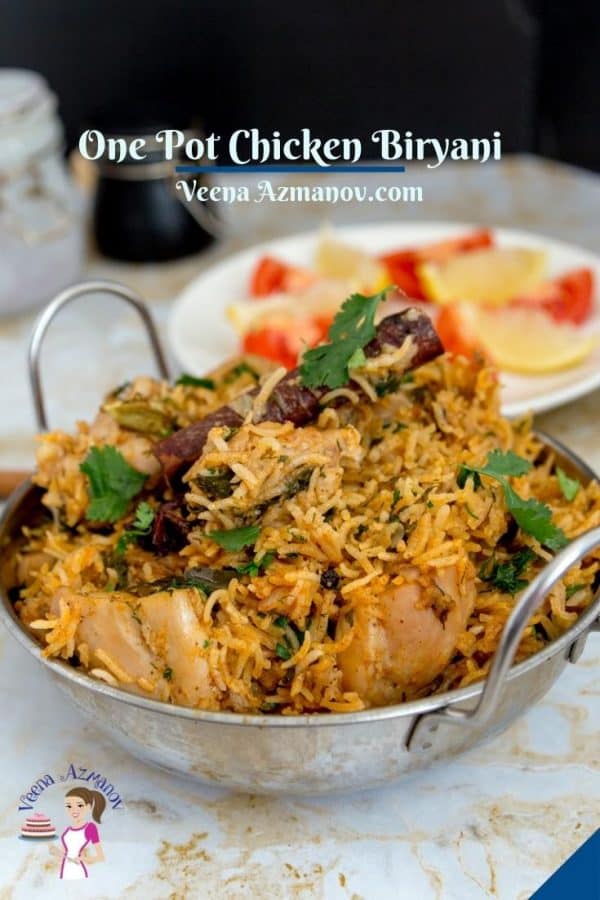 Pinterest image for biryani with chicken in an Indian pot