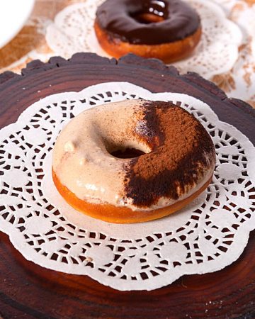 A glazed donut with tiramisu.