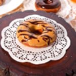 A plate with dulce de leche donuts.