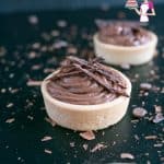A mini chocolate  tart on a table.