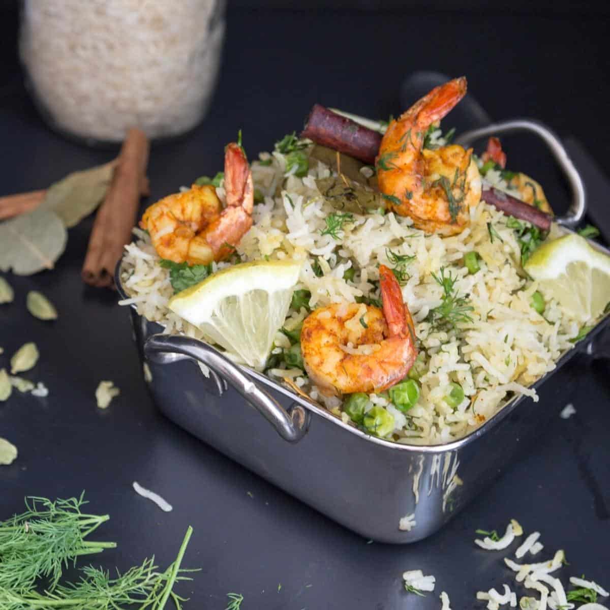 Shrimps over a bed of rice pilaf.