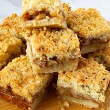 Stack of apple bars on the table.