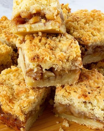 Stack of apple bars on the table.