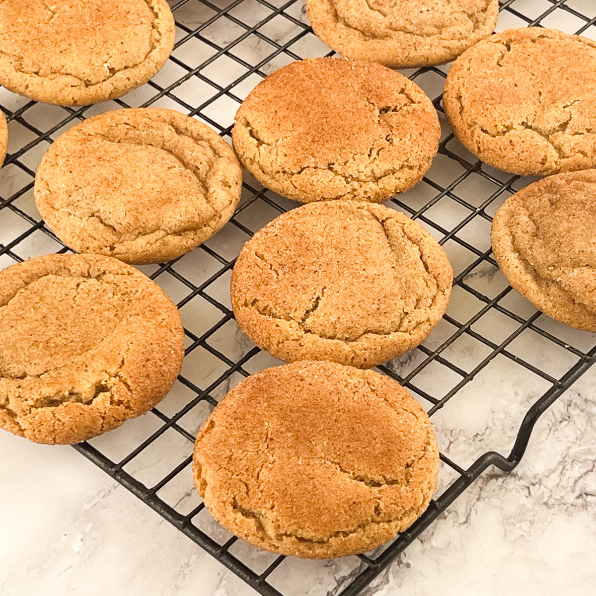 A wire rack with fresh baked cookies.