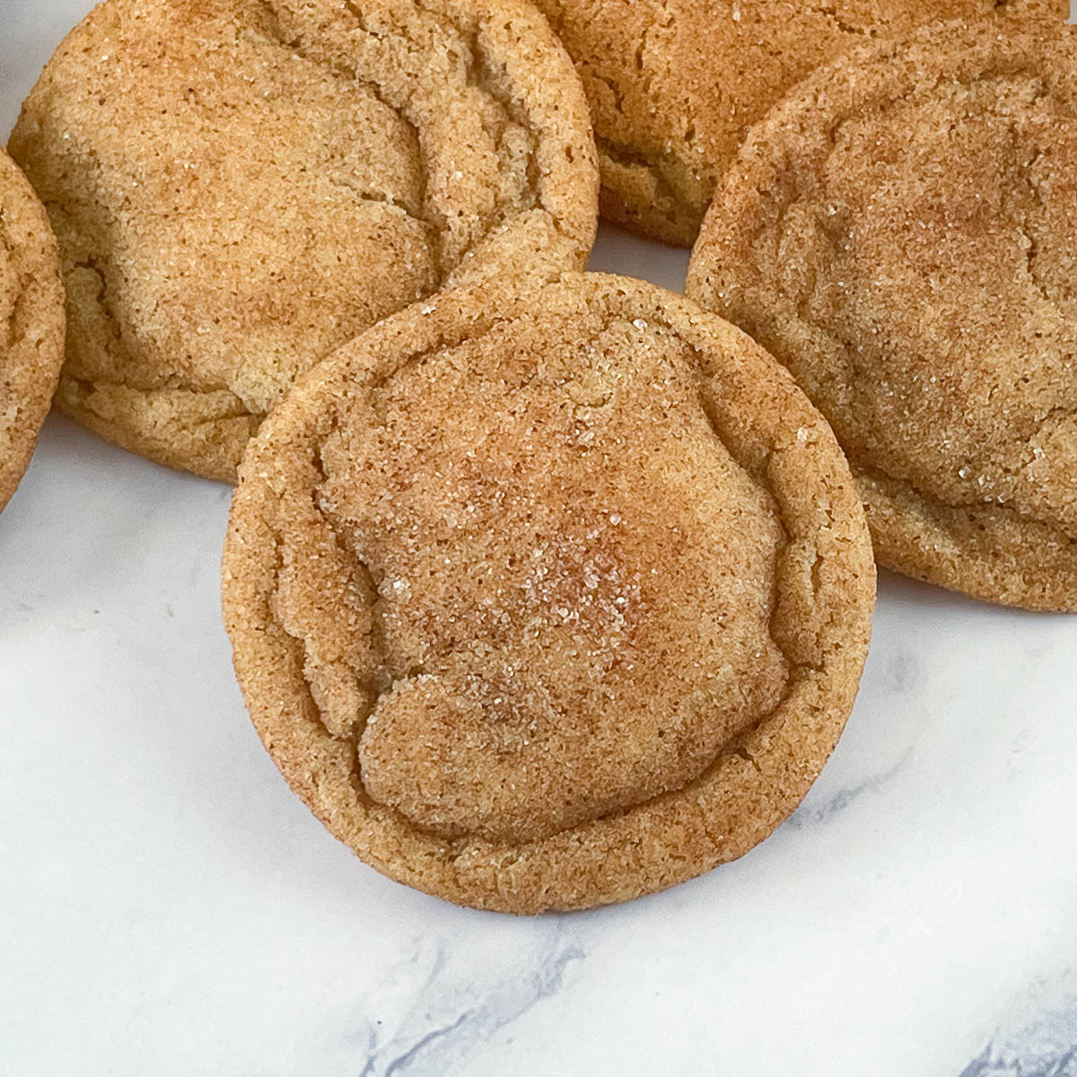Fresh baked cinnamon sugar cookies on the table.