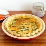 A quiche in a pie pan.