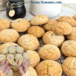 Almond cookies on a cooling rack.