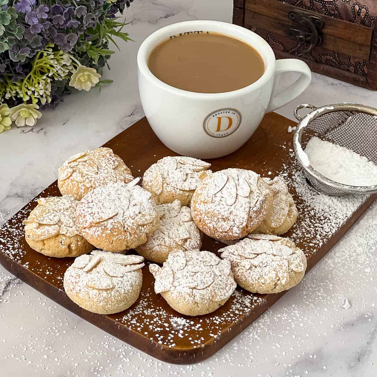 Almond cookies on the table with coffee.