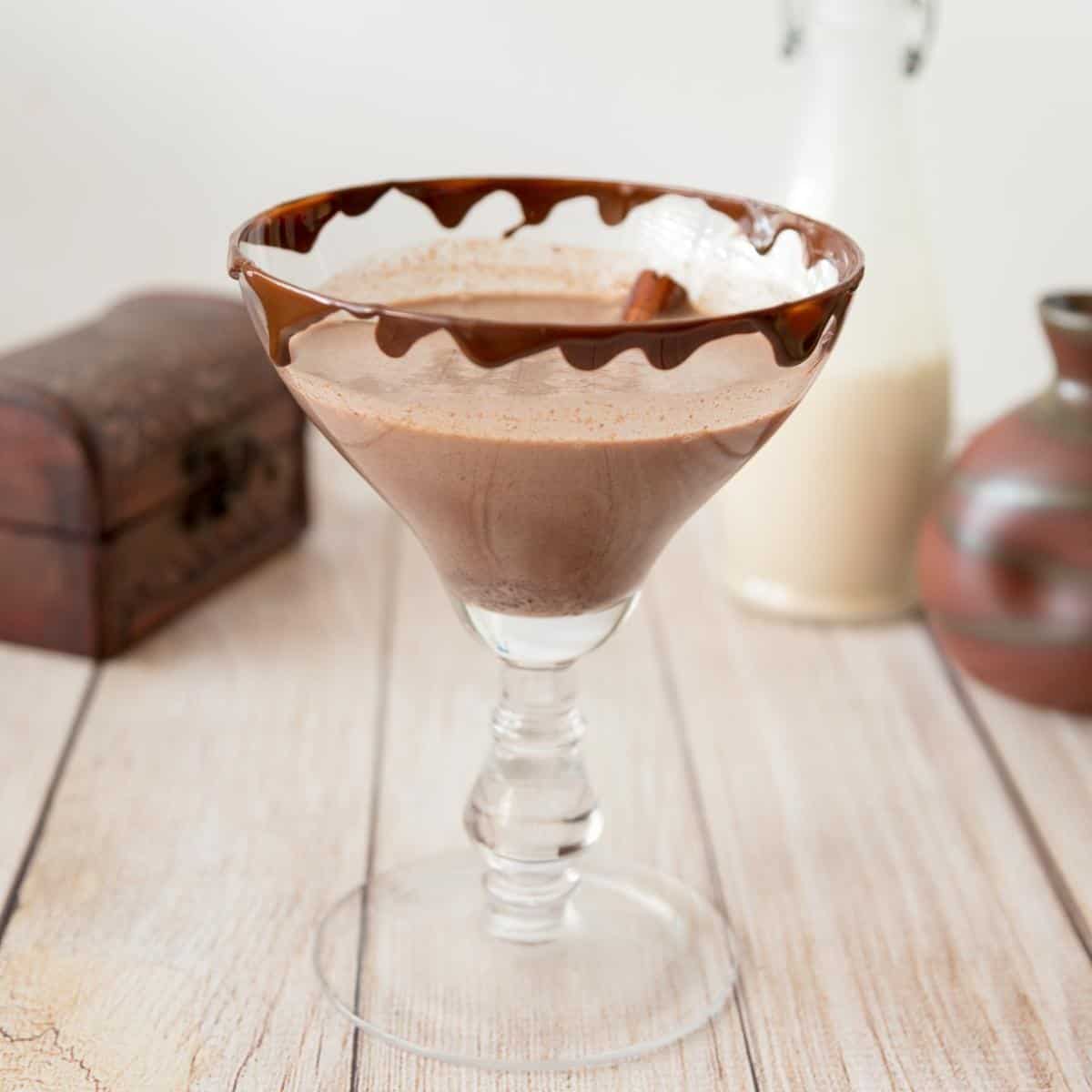 A martini glass with chocolate martini
