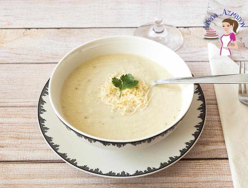 A bowl of cauliflower soup on a table.