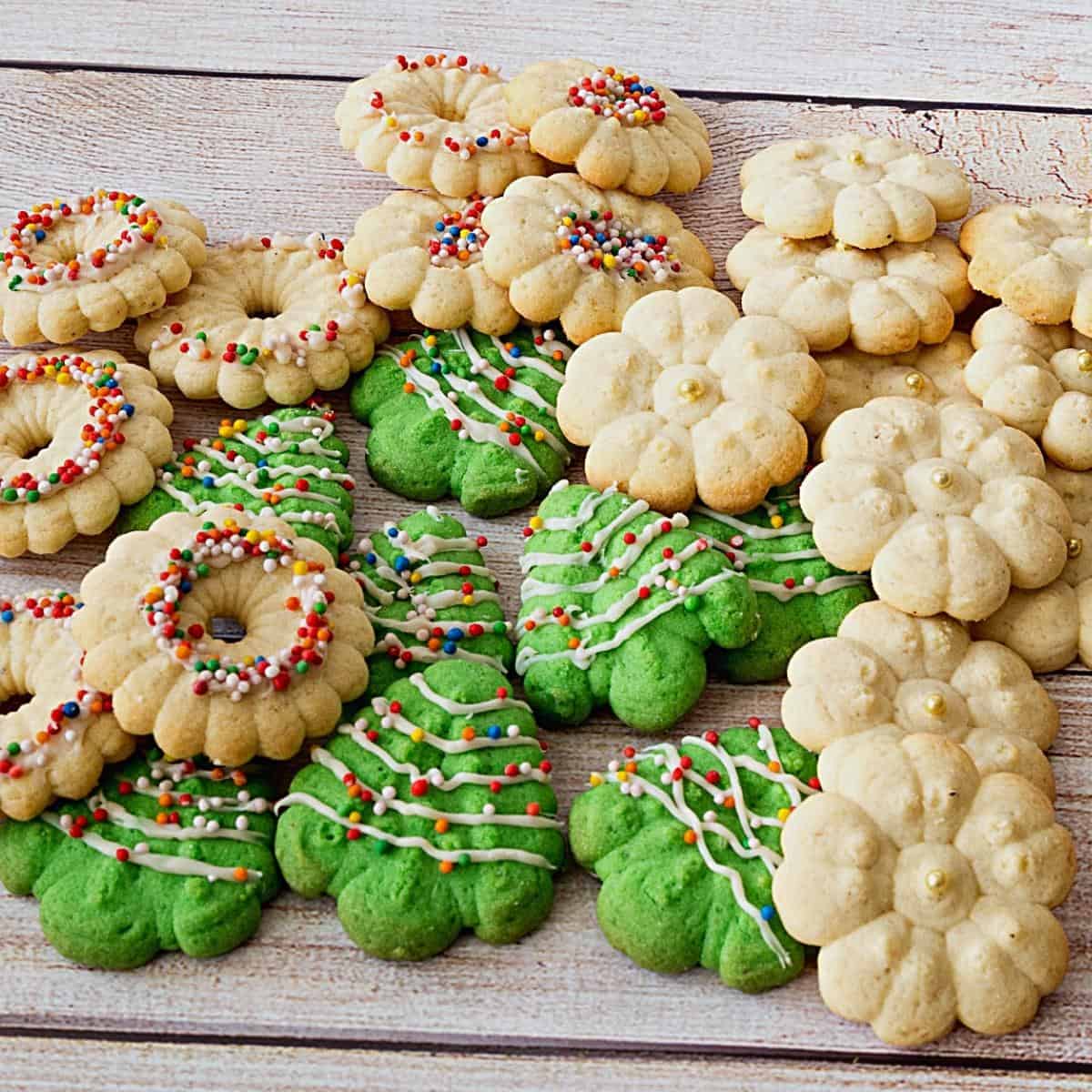 A stack of Christmas cookies on the table.