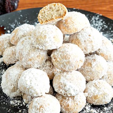 A plate with snowball cookies.
