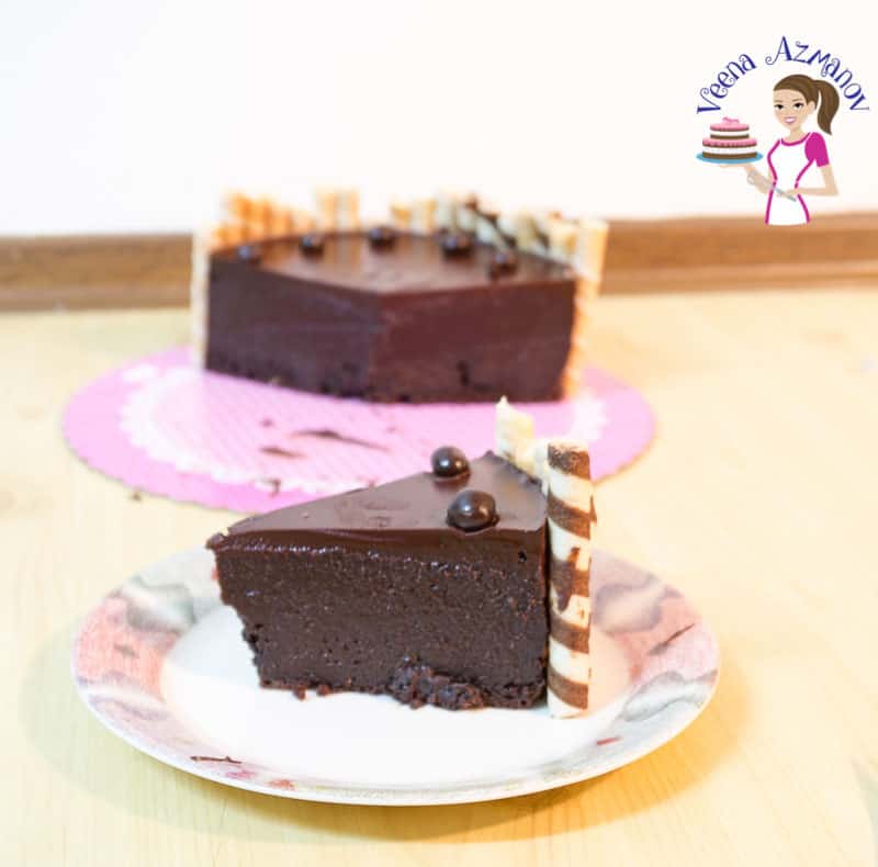 A piece of flourless chocolate cake on a plate.