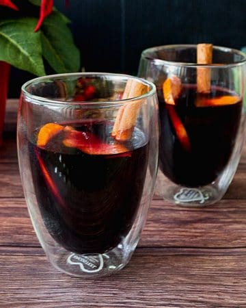 Two glasses with mulled red wine.
