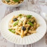 Chicken pasta recipe in a white plate.