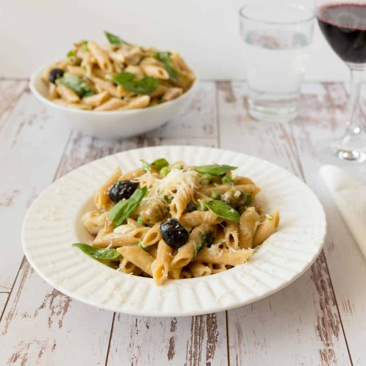 A plate with chicken pasta recipe.