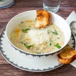chicken pot pie soup in a bowl with croutons.