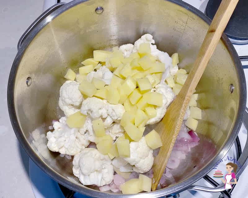 Add the cauliflower and potato to the pot