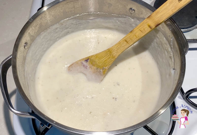 The creamy cauliflower soup in the pot