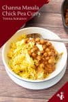 A bowl of channa masala and rice.