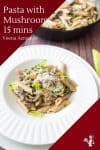 A plate of pasta with mushrooms.
