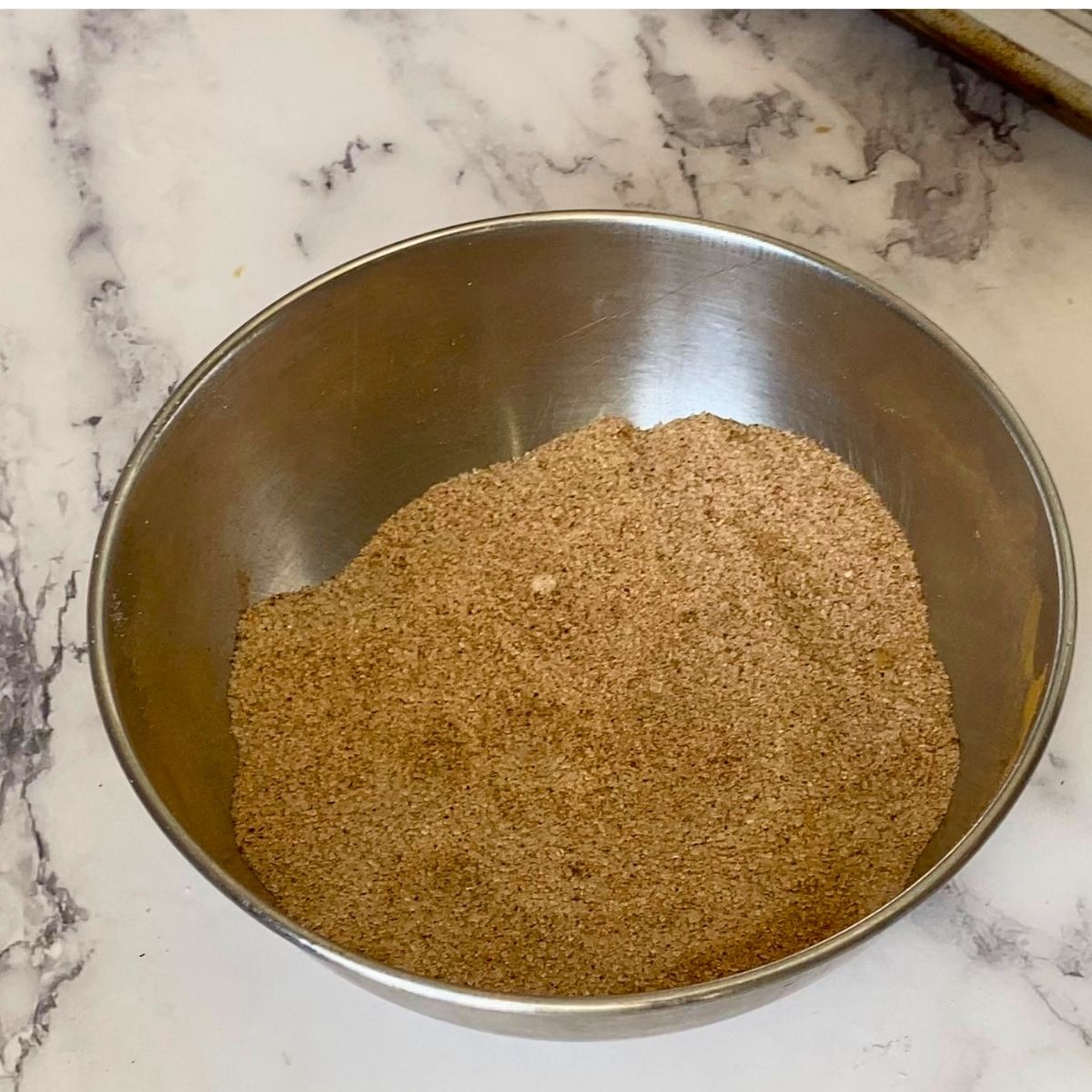 A bowl with cinnamon sugar.