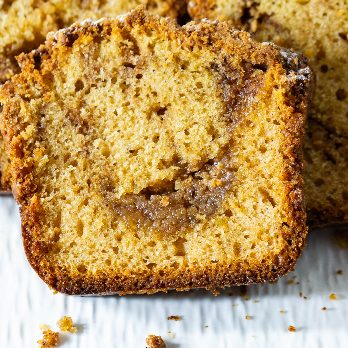 Slices of coffee cake with a crumble top.