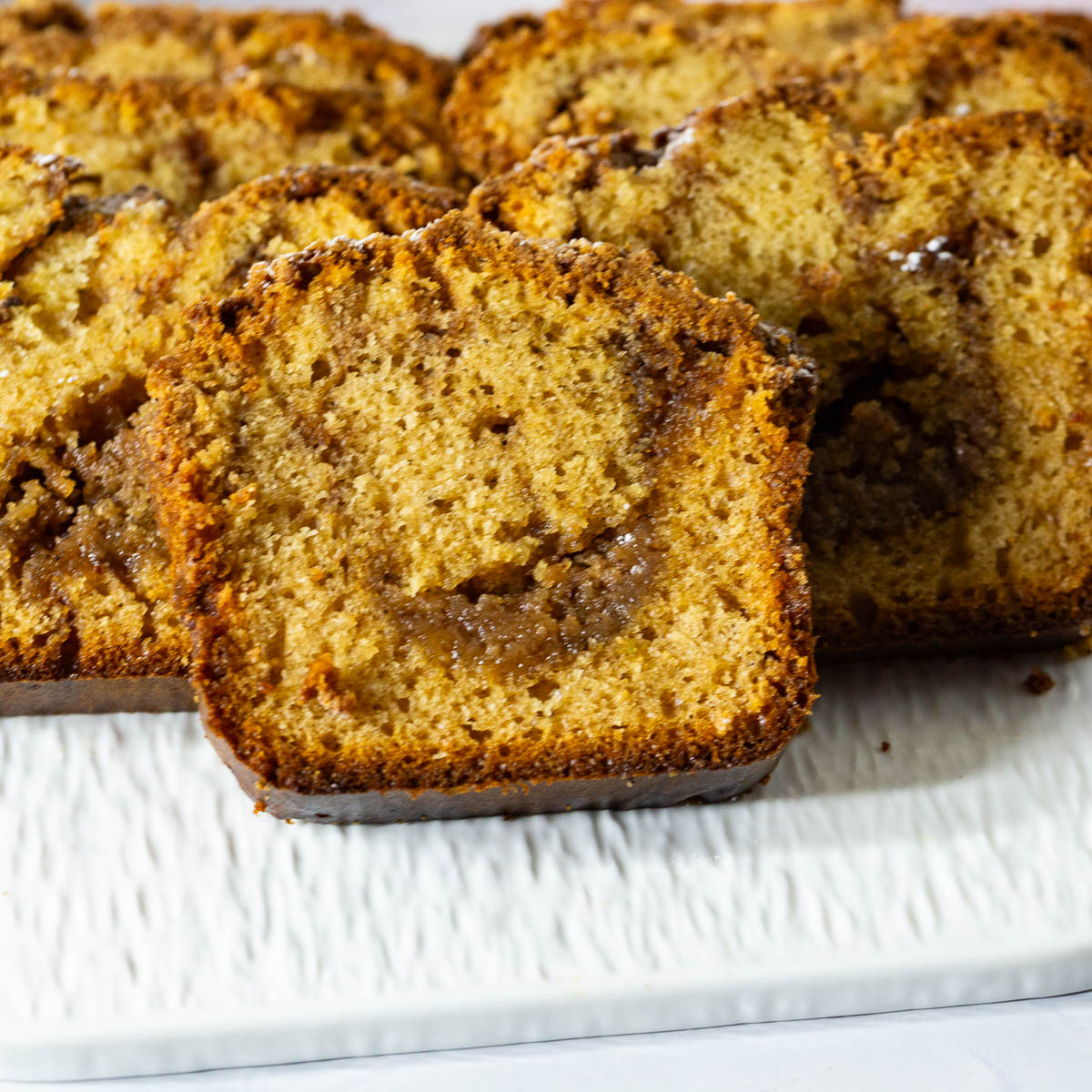 Slices of cinnamon swirl loaf cake.