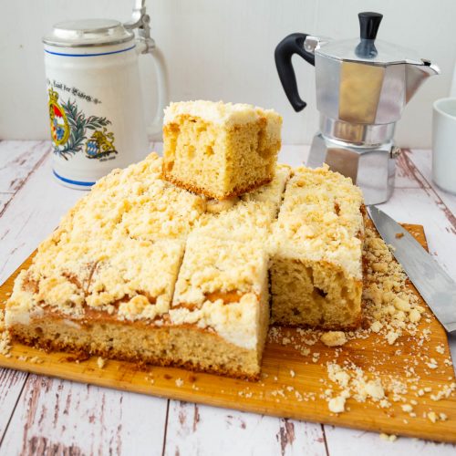 Sliced coffee cake on the table.