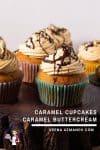 Caramel cupcakes on a wooden board.