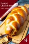 A close up of a Challah bread on a cutting board.