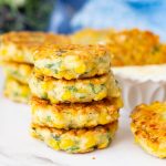 A stack of corn patties on the table.