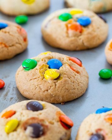 Cookies with M&Ms on a table.