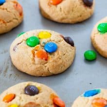 A baking tray with M&M cookies.