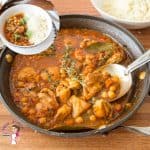 A pan with chicken stew.