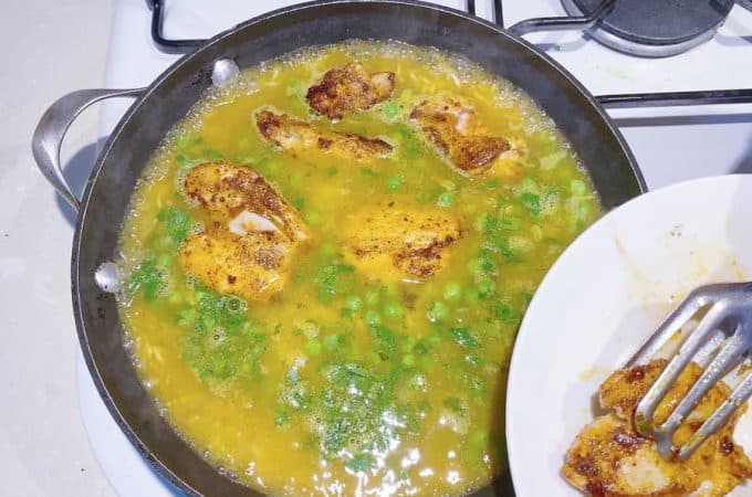 Saute the rice with turmeric and chicken