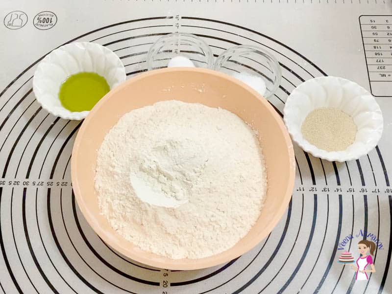 Prepare the pizza crust from scratch for Margherita