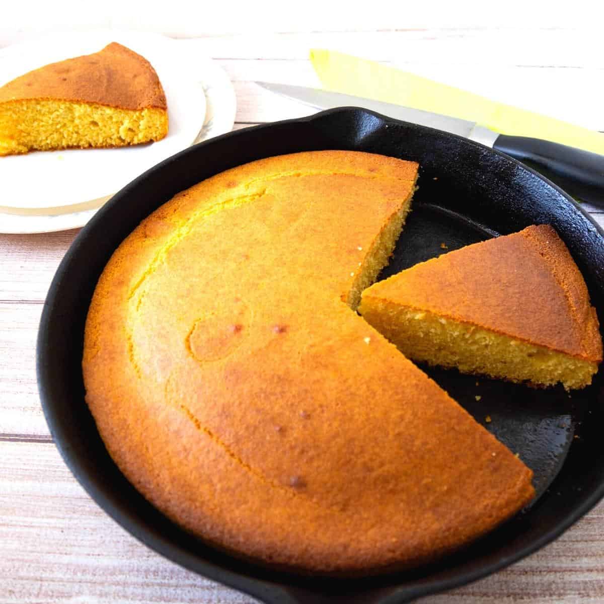 A skillet with baked cornbread buttermilk.