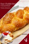 Challah bread on a wooden board.