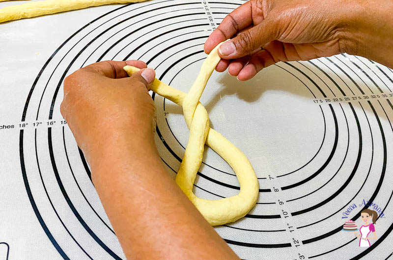 Shaping the pretzels