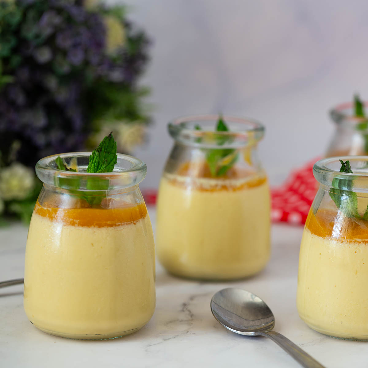 Panna cotta jars on the table.