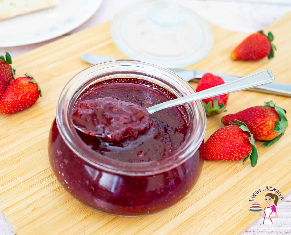A jar of Strawberry jam.