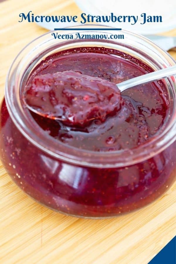 close up of the strawberry jam in a jar.