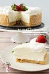 A slice of cheesecake on a plate, with the remaining cheesecake on a cake stand.