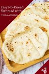 A few flatbread on a wooden tray for display