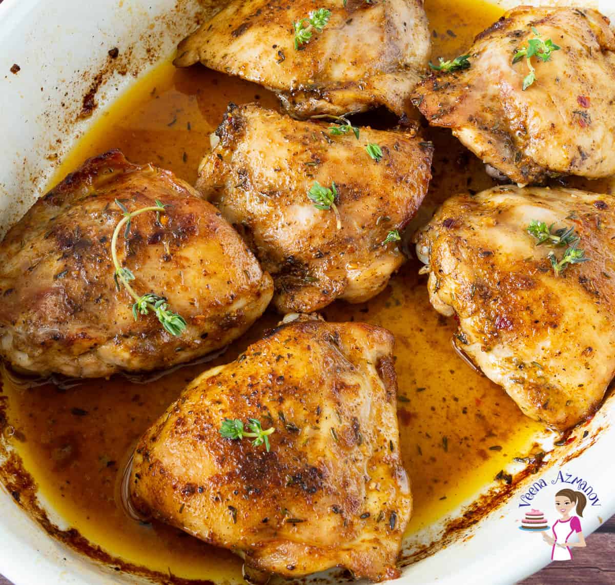 Baked chicken with cajun spice in a ceramic baking dish